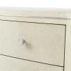 Cream coloured, shagreen effect bedside table with three drawers