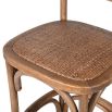 wood and rattan barchair with arching shapes in base