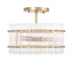 glamorous ceiling lamp in antique brass and encircled by ribbed clear glass