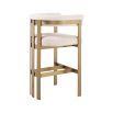 Glamorous brass frame bar stool and cream boucle upholstery