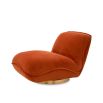 A beautiful upholstered savona orange velvet chair by Eichholtz with a brushed brass base 