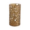 Chic candle holder with a hole pattern and brushed brass finish