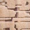 Artistic textured rug with plush wool composition and beige tones