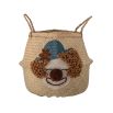 Storage basket with adorable clown illustration and varying textures. 