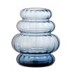 Blue coloured glass vase in curved design