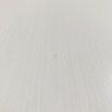 white dresser with dent on rear