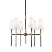 Glamorous six-light chandelier with brass accents and conical shades