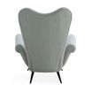 Icy blue linen armchair with swooping silhouette and black steel legs