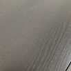 Scuff on the surface of one of the tables