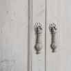 Classic design white wood sideboard with four cupboards and protruding middle two