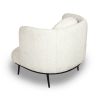 Boucle sand chair with tall full wing back and accent cushion