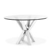 Contemporary and sleek round table with structured nickel base. 