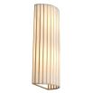 Brass ribbed wall light with gentle radiant glow