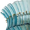 Elegant blue glass chandelier with curved panels