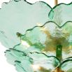 Green glass floral style chandelier with brass ceiling fixture