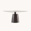 Luxurious glass top dining table with conical wooden base