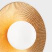 Glamorous gold-disc style wall sconce with ribbed detail