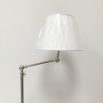 Nickel swing arm floor lamp with white shade