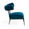 Blue velvet laid back lounge chair with brass accents