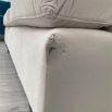 romantic luxury designer sofa in neutral velvety upholstery with minor marks and scuff