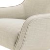Cream upholstered swivel chairs with nickel base