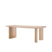 Striking silhouette dining table in natural oak finish