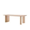 Striking silhouette dining table in natural oak finish