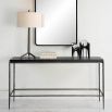 Minimalist console table with hammered texture and shiny black finish