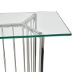 Stainless steel console table with geometric legs and clear glass top