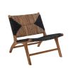 Enchanting laid-back lounge chair with black graphic pattern and natural textures.