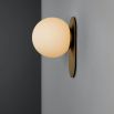 small wall sconce with beautiful brushed brass finish and a gorgeous detailed frosted glass bulb