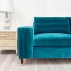 A luxurious teal-coloured 4-seater sofa