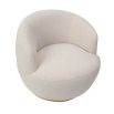 Small and circular boucle sand swivel chair with rounded edges and brass base