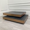 Lovely black and brass coffee tables with overlapping layers