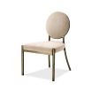 Elegant dining chair with greige upholstery and dark brass frame