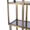 Elegant and glamorous shelving unit finished in brushed brass with geometric design