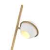 Elegant and unique floor lamp with orb shades and brass stem mounted on black marble base