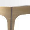 Round side table with brass frame and bevelled glass surface