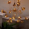 Unique brass chandelier with adjustable arms