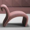 A contemporary chair by Eichholtz with a luxury boucle upholstery