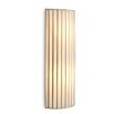 Brass ribbed wall light with gentle radiant glow