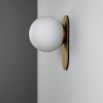 small wall sconce with beautiful brushed brass finish and a gorgeous detailed frosted glass bulb