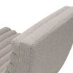 Statement curved lounge chair with boucle taupe channelling