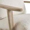 lovely boucle armchair with natural wood