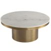 Round brass coffee table with white marble top