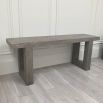 Stylish and natural finish console table with bold, square legs