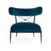Blue velvet laid back lounge chair with brass accents