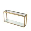 Glamorous side table with brass frame and glass surfaces