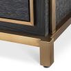 Elegant modern bedside table with dazzling brass details.