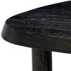 Black wooden coffee table with pebble-shaped top and three legs